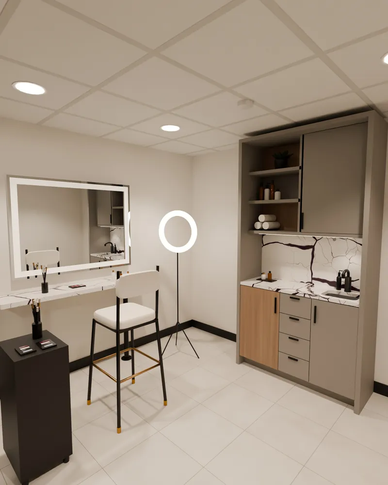 Render of Studio 22 set up for makeup, with a tall chair under a ring light