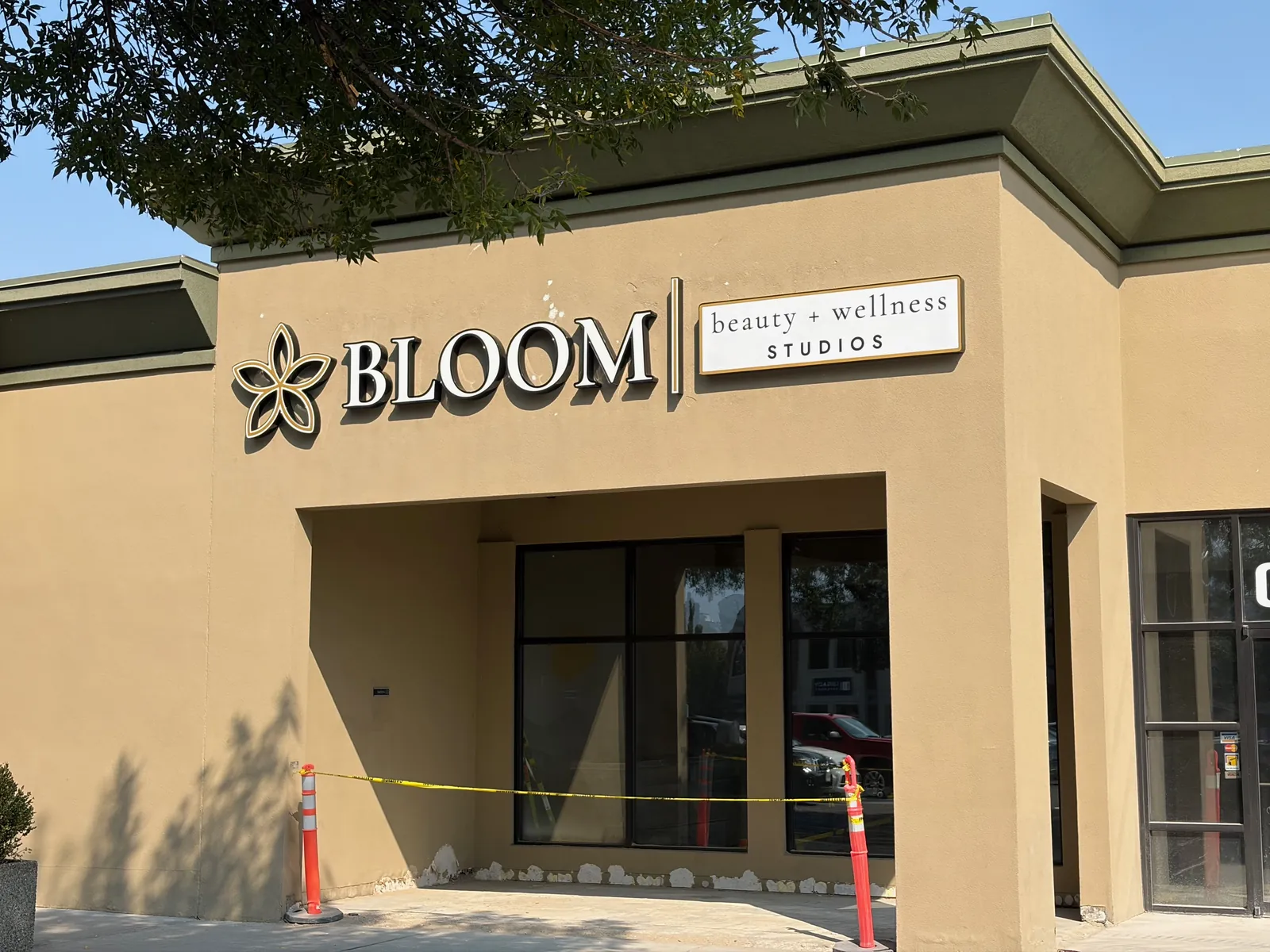 The Bloom storefront in August 2026, sign up, entry under construction
